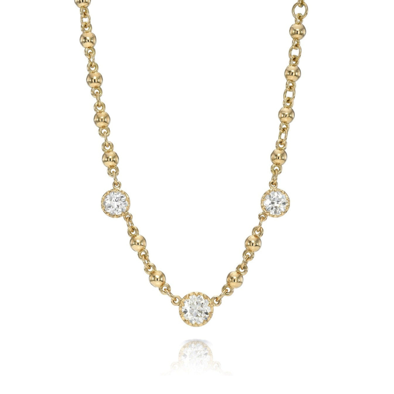 SINGLE STONE THREE STONE ROSALINA NECKLACE featuring 1.61ctw J,K,M-VS-SI2 old mine cut diamonds prong set in a handcrafted 18K yellow gold necklace.