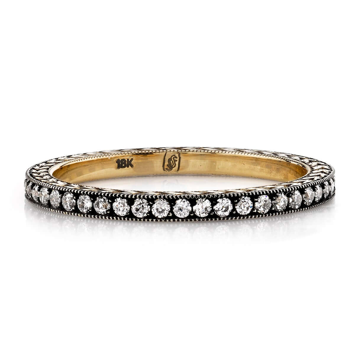 SINGLE STONE MOLLY BAND | Approximately 0.40ctw G-H/VS old European cut diamonds set in an handcrafted eternity band featuring engraved sidewalls. Approximate band with 1.6mm. Please inquire for additional customization.