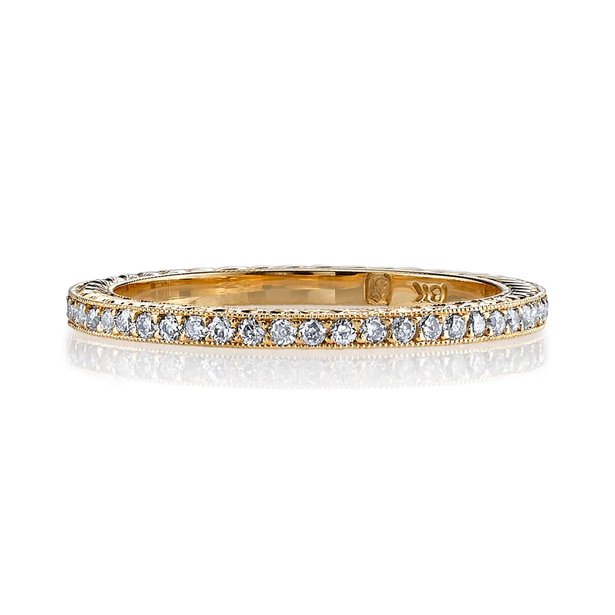SINGLE STONE MOLLY BAND | Approximately 0.40ctw G-H/VS old European cut diamonds set in an handcrafted eternity band featuring engraved sidewalls. Approximate band with 1.6mm. Please inquire for additional customization.