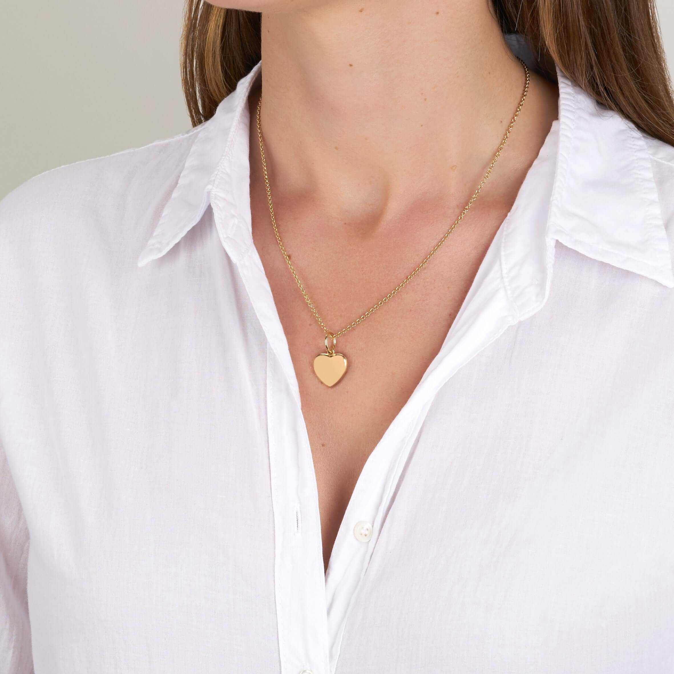 SINGLE STONE VIOLA PENDANT featuring Handcrafted 18K yellow gold heart-shaped charm. -Every year, 12 million girls are married before the age of 18...that’s one girl every three seconds. We designed this beautiful heart charm with Vow for Girls. For every