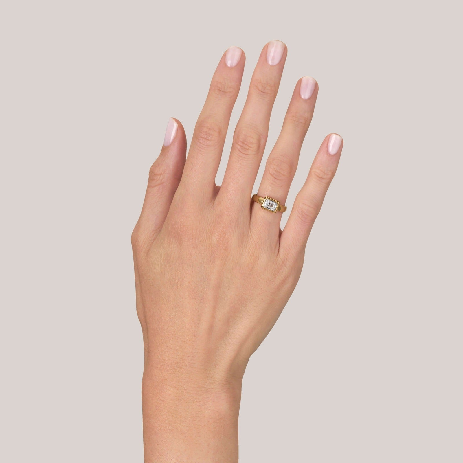 SINGLE STONE ZARA RING featuring 1.08ct H/SI2 EGL certified carré cut diamond set in a handcrafted 18K yellow gold mounting.