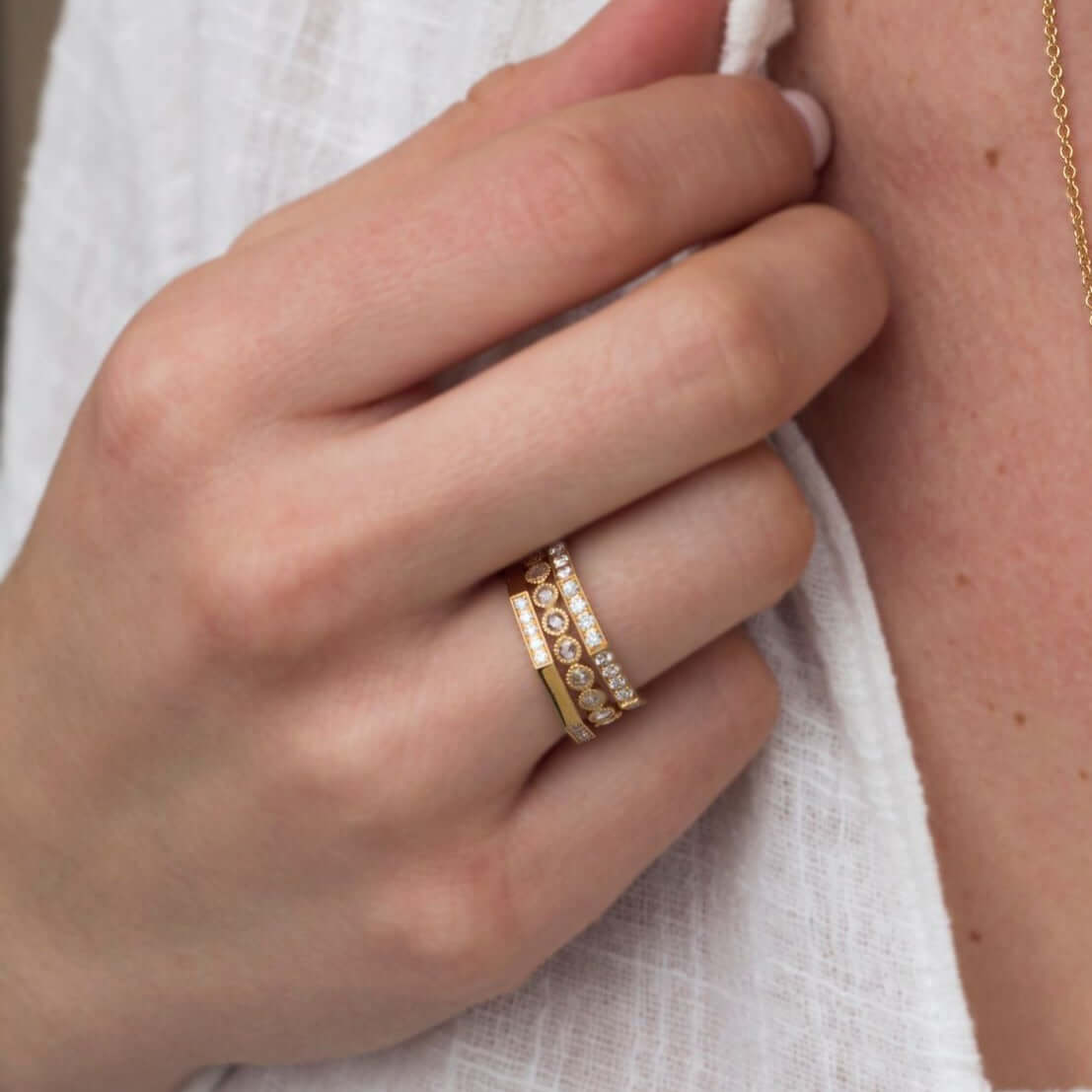 SINGLE STONE MAIA BAND | Approximately 0.20ctw old European cut diamonds set in a handcrafted sectional octagonal band. Approximate band width 2mm. Please inquire for additional customization.