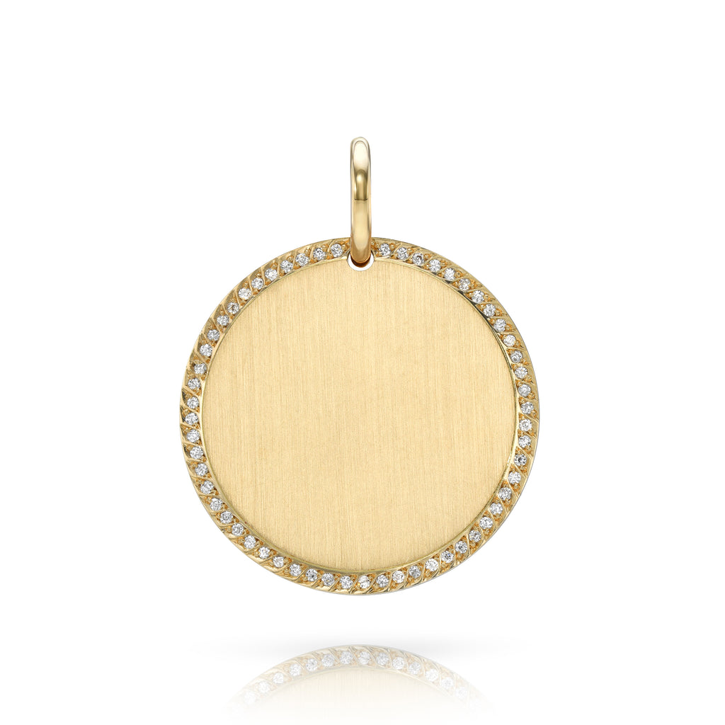 Single Stone's PAVÉ FRAME ROUND DISC pendant  featuring Old European cut diamonds pavé set in a handcrafted 18K yellow gold engravable round pendant. 15mm: approximately 0.10ctw 20mm: approximately 0.14ctw 25mm: approximately 0.18ctw 30mm: approximately 0.25ctw Price includes monogrammed engraving of up to three letters in any of the styles shown above - please be sure to s
