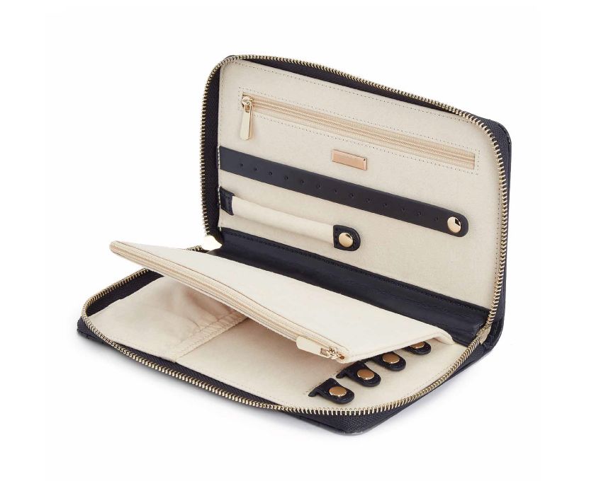 MARIA JEWELRY PORTFOLIO, Material: Leather 
Storage: 1 earring tab, 1 ring tab, 2 zip compartments, 4 snap-on necklace hooks with pocket 
LusterLoc™: Allows the fabric lining the inside of your jewellery cases to absorb the hostile gases known to cause tarnishing. Under typical storage conditions, it can prevent tarnishing for up to 35 years 
8.75" L X 5.25" W X 1.25" H 
, Gifts, WOLF DESIGNS, INC