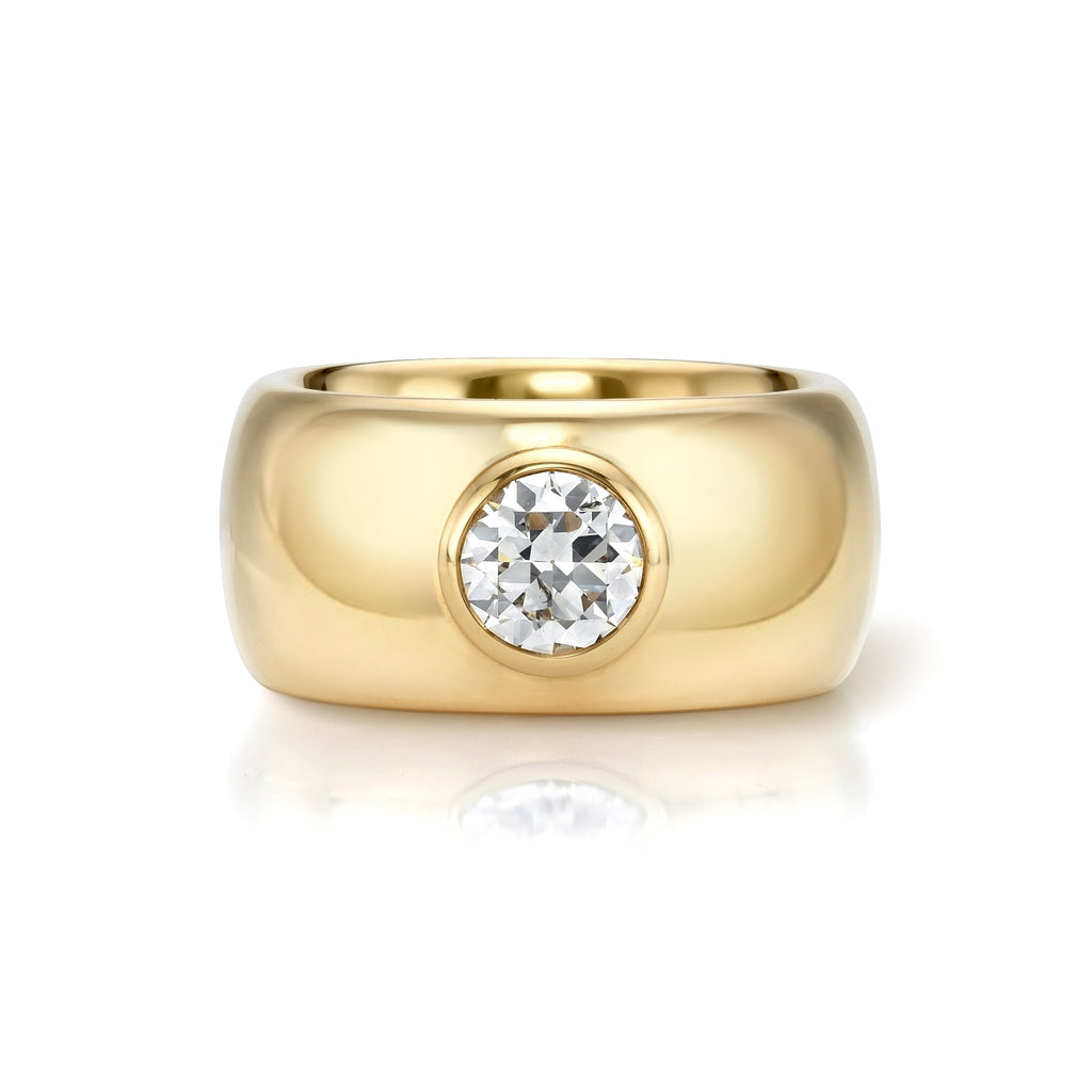 Single Stone's ADRINA  featuring 1.03ct K/SI1 GIA certified old European cut diamond bezel set in a handcrafted 18K yellow gold wide dome mounting.
