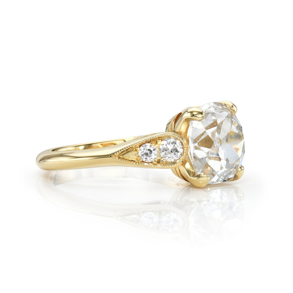 Single Stone's AMANDA ring  featuring 2.35ct L/VS1 GIA certified antique cushion cut diamond with 0.15ctw old European cut accent diamonds prong set in a handcrafted 18K yellow gold mounting.  
