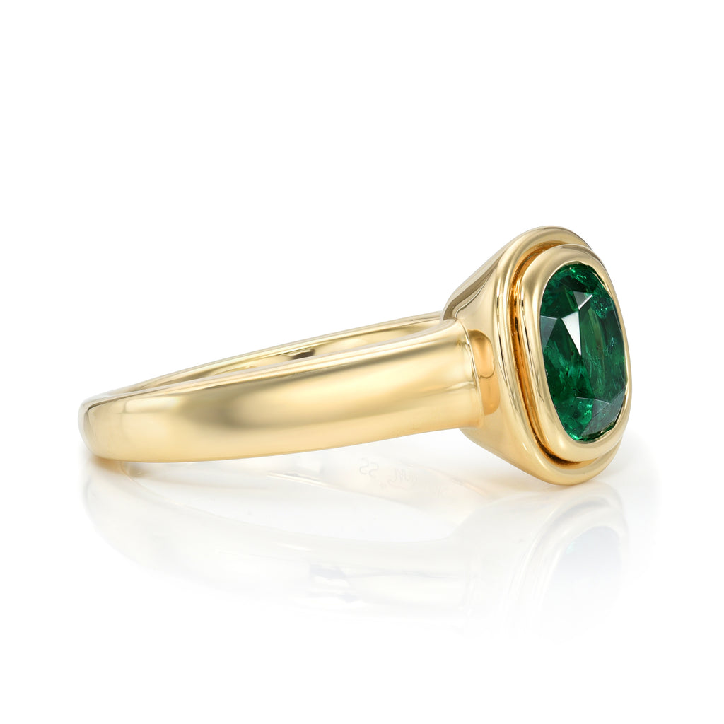 Single Stone's ARIA ring  featuring 1.64ct GIA certified Zambian antique cushion cut green emerald bezel set in a handcrafted 18K yellow gold mounting.
