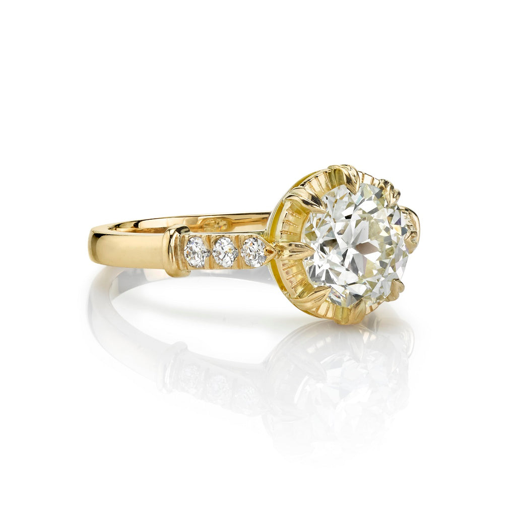 Single Stone's ARIELLE ring  featuring 1.58 K/VS2 GIA certified old European cut diamond with 0.10ctw old European cut accent diamonds prong set in a handcrafted 18K yellow gold mounting.
