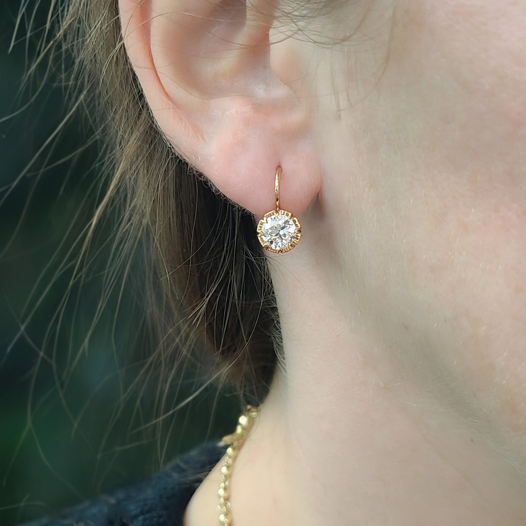 Single Stone's ARIELLE DROPS earrings  featuring 2.17ctw K/VS2 GIA certified old European cut diamonds prong set in handcrafted 18K yellow gold drop earrings.  
