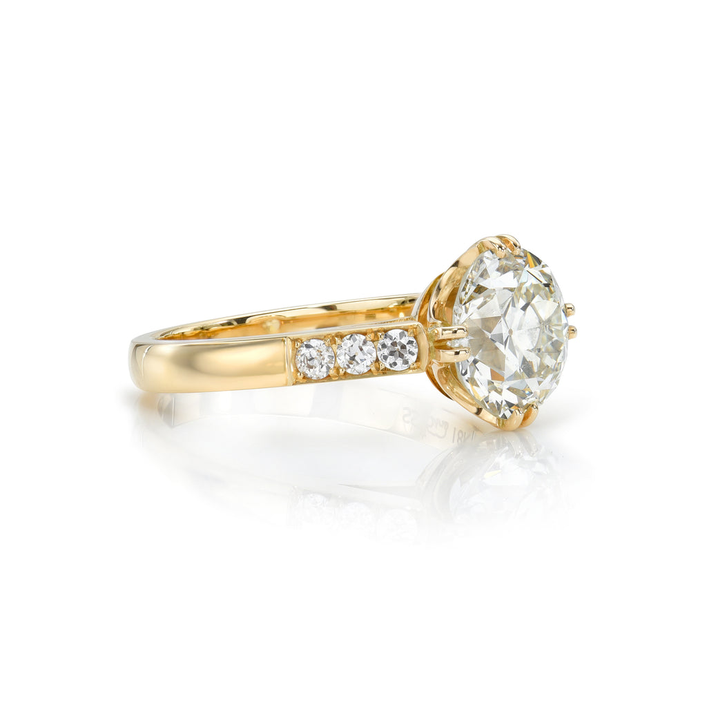 Single Stone's BAUER ring  featuring 2.35ct K/VS2 GIA certified old European cut diamond with 0.18ctw old European cut accent diamonds prong set in a handcrafted 18K yellow gold mounting.
