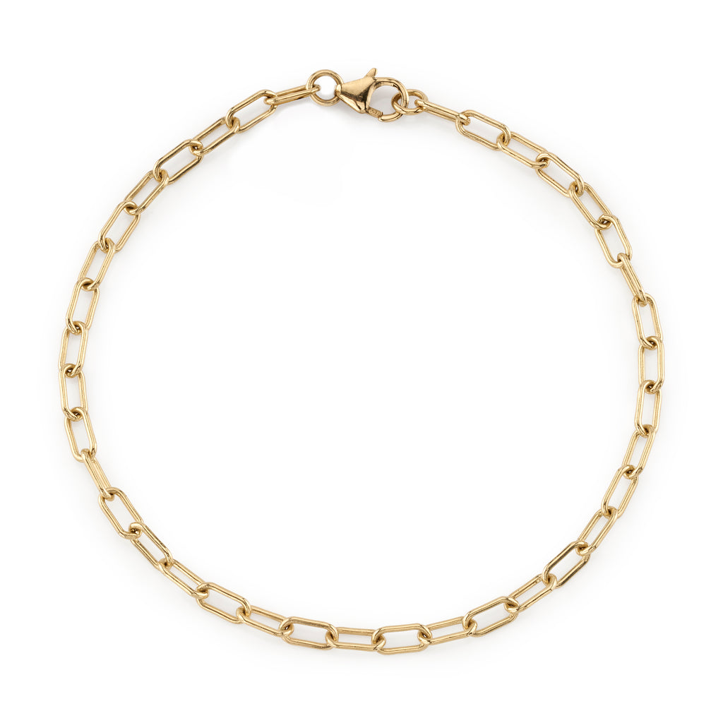 
Single Stone's Bond bracelet  featuring Handcrafted long link 18K yellow gold bracelet.
Bracelet measures 7.5".
Please inquire for additional customization. 
