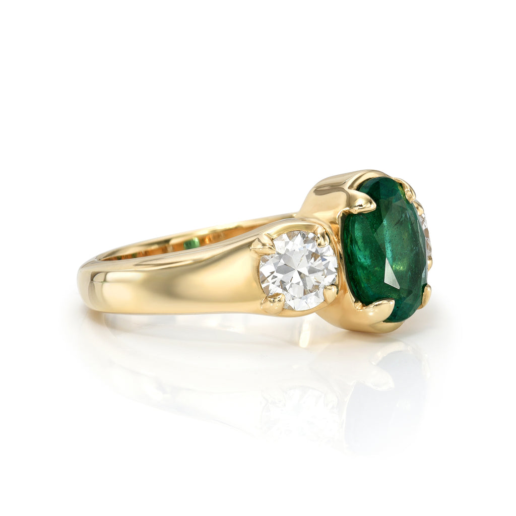 Single Stone's BROOKLYN ring  featuring 2.05ct GIA certified Zambian cushion cut green emerald with 0.94ctw I-K/SI1-SI2 GIA certified old European cut accent diamonds prong set in a handcrafted 18K yellow gold mounting.
