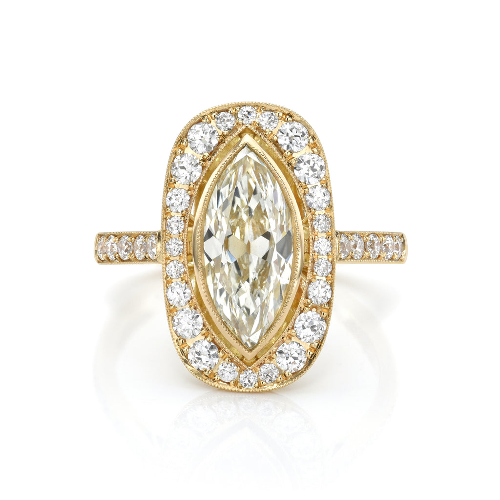 
Single Stone's Camille ring  featuring 1.61ct M/VS2 GIA certified marquise cut diamond with 0.48ctw old European cut accent diamonds set in a handcrafted 18K yellow gold mounting. 
 

