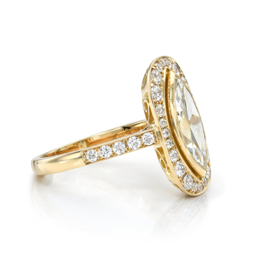 Single Stone's CAMILLE ring  featuring 1.61ct M/VS2 GIA certified marquise cut diamond with 0.48ctw old European cut accent diamonds set in a handcrafted 18K yellow gold mounting.   
