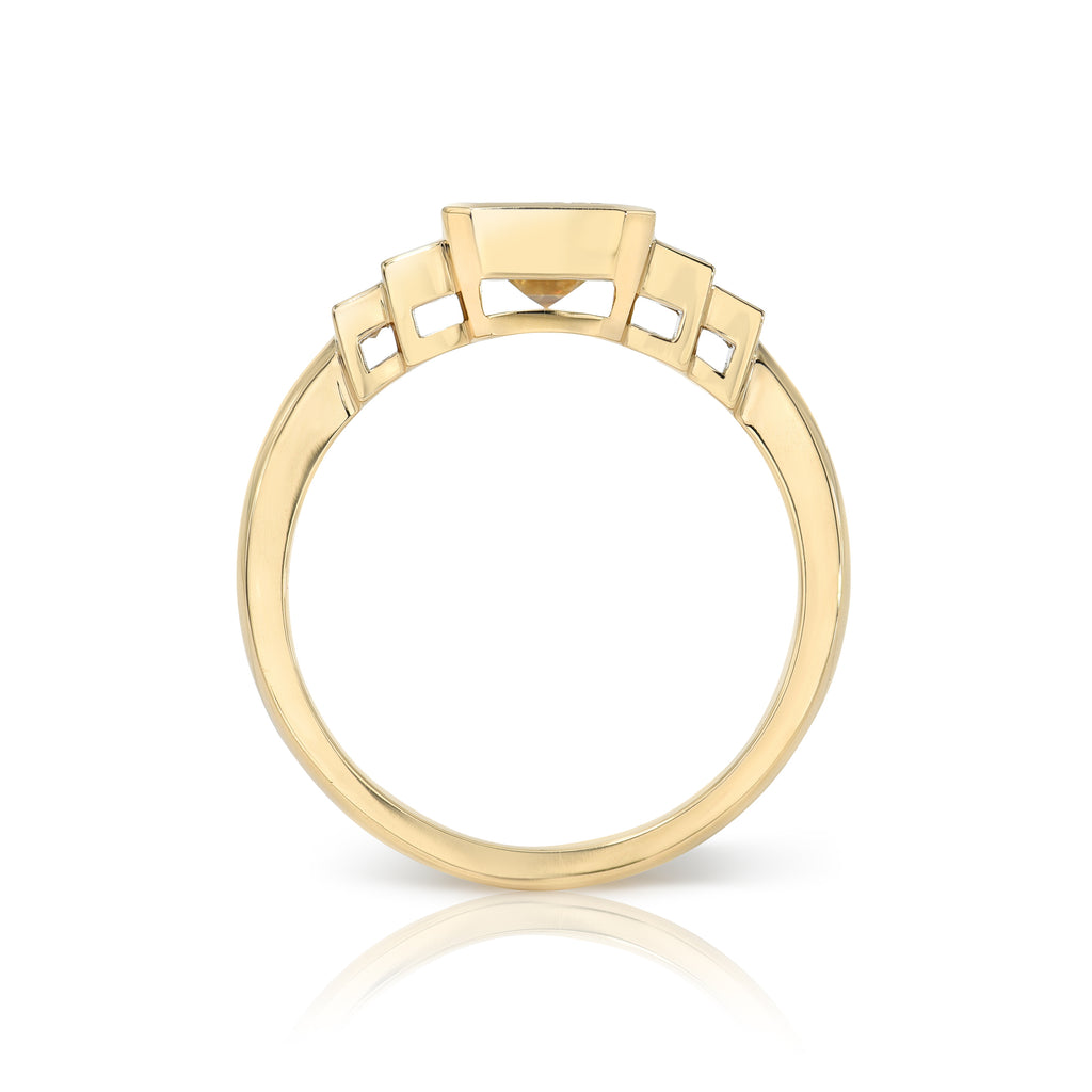 Single Stone's CAROLINE ring  featuring 1.51ct M/VS1 GIA certified emerald cut diamond with 0.54ctw baguette cut accent diamonds bezel set in a handcrafted 18K yellow gold mounting.
