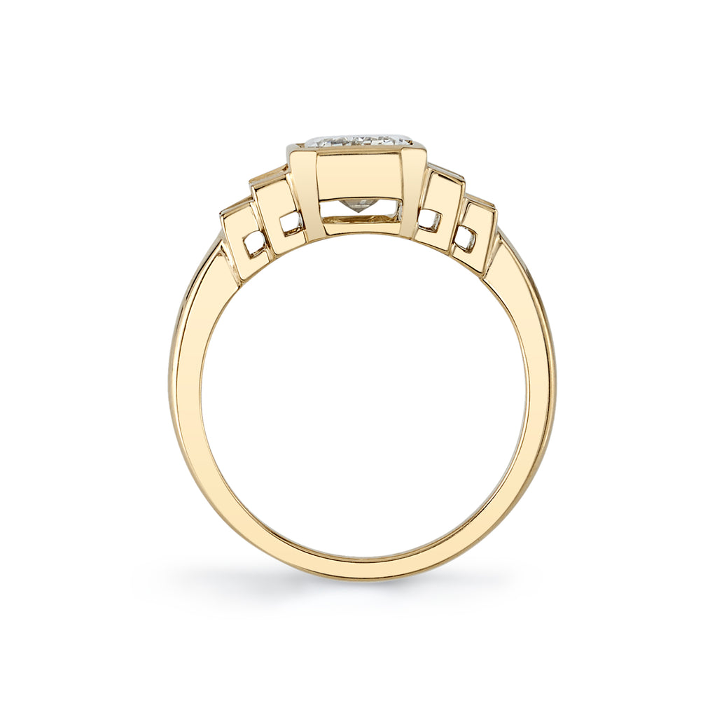 Single Stone's CAROLINE ring  featuring 2.01ct N/SI1 GIA certified emerald cut diamond with 0.76ctw baguette cut accent diamonds bezel set in a handcrafted 18K yellow gold mounting.
