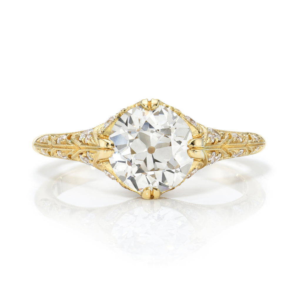 
Single Stone's Charlotte ring  featuring 1.43ct L-Faint Brown/VS1 GIA certified old European cut diamond with 0.22ctw old European cut accent diamonds prong set in a handcrafted 18K yellow gold mounting.
