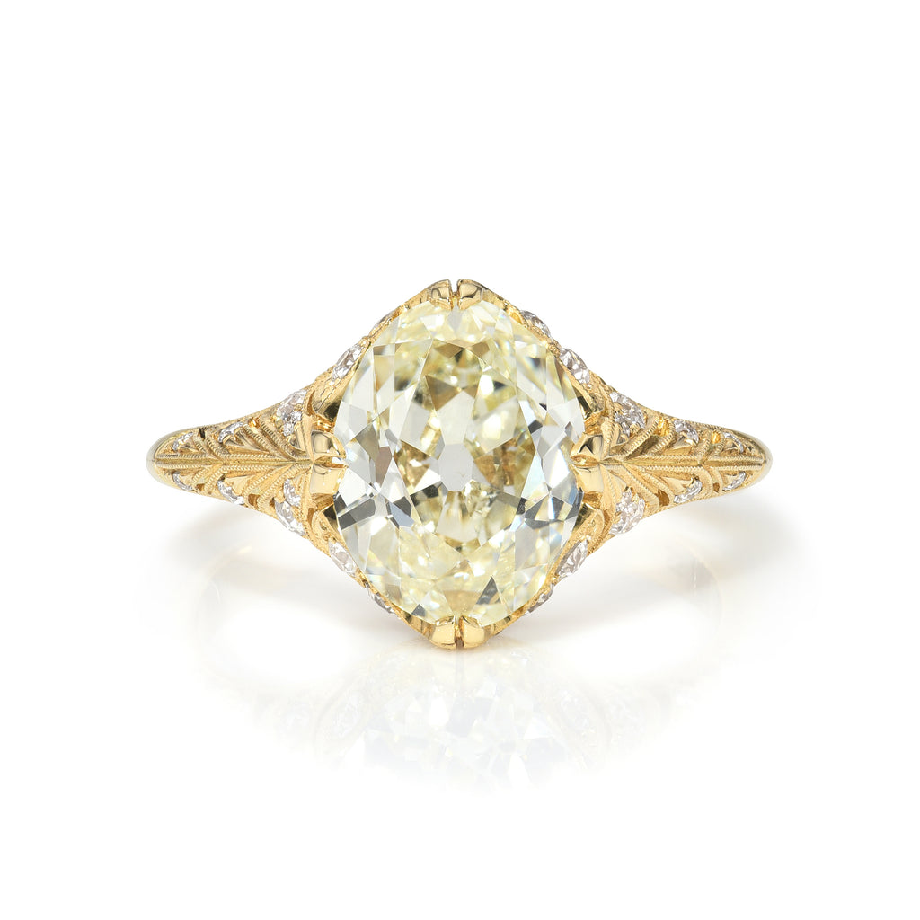 
Single Stone's Charlotte ring  featuring 2.50ct N/VS2 GIA certified moval cut diamond with 0.23ctw old European cut accent diamonds prong set in a handcrafted 18K yellow gold mounting.
