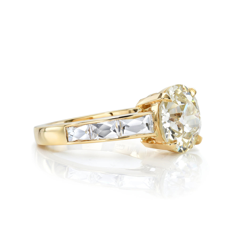 Single Stone's CHRISTINA ring  featuring 3.01ct N/VS2 GIA certified old European cut diamond with 0.84ctw French cut accent diamonds set in a handcrafted 18K yellow gold mounting.
