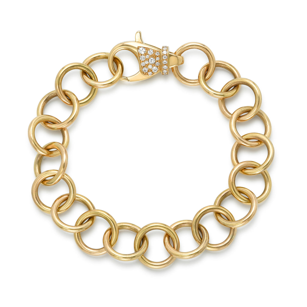 
Single Stone's Club bracelet with cobblestone clasp  featuring Approximately 0.50ctw varying old cut and round brilliant cut diamonds prong set in a handcrafted 18K yellow gold bracelet.
Bracelet measures 7.5".
