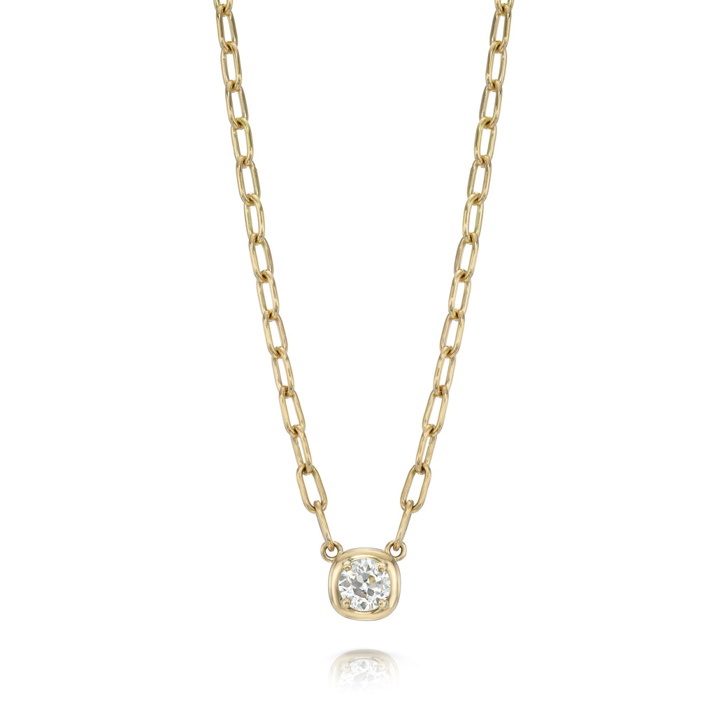 
Single Stone's Cori necklace earrings  featuring 0.93ct J/SI1 GIA certified old european cut diamond prong set in a handcrafted 18K yellow gold pendant necklace.
Necklace measures 17".
 
