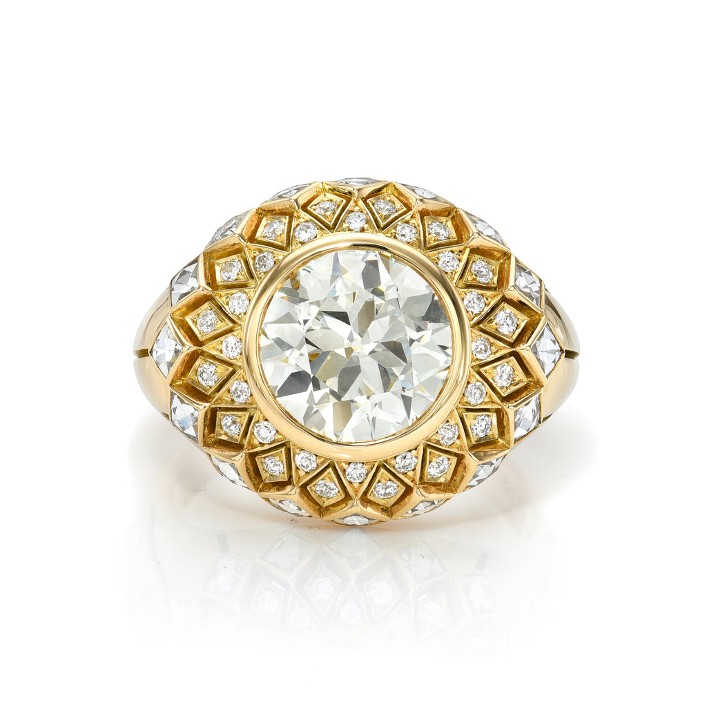 
Single Stone's Cornelia ring  featuring 2.49ct O-P/VS2 GIA certified old European cut diamond bezel set with 0.81ctw mixed cut accent diamonds set in a handcrafted 18K yellow gold mounting.

