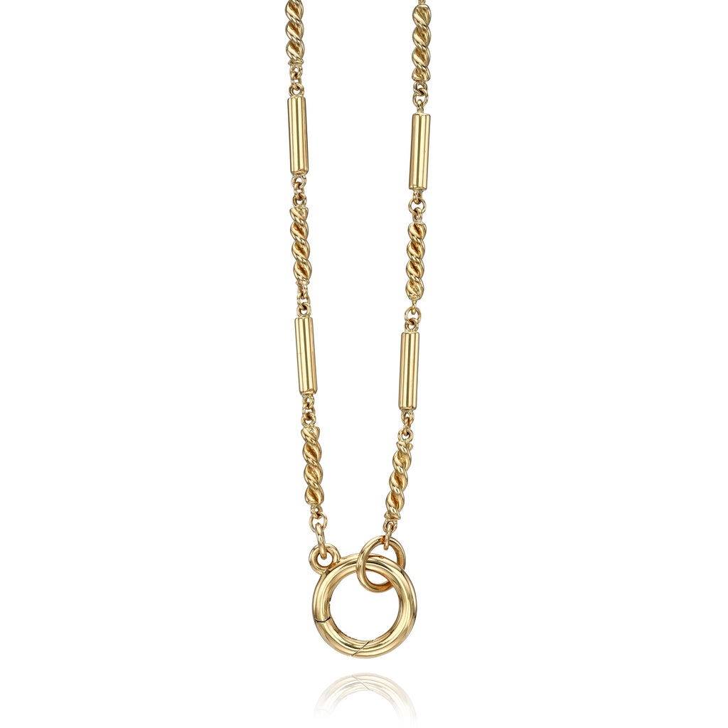 
Single Stone's Darla annex  featuring Handcrafted 18K yellow gold alternating cylinder and twisted link necklace with charm holder. 
Necklace measures 17".

