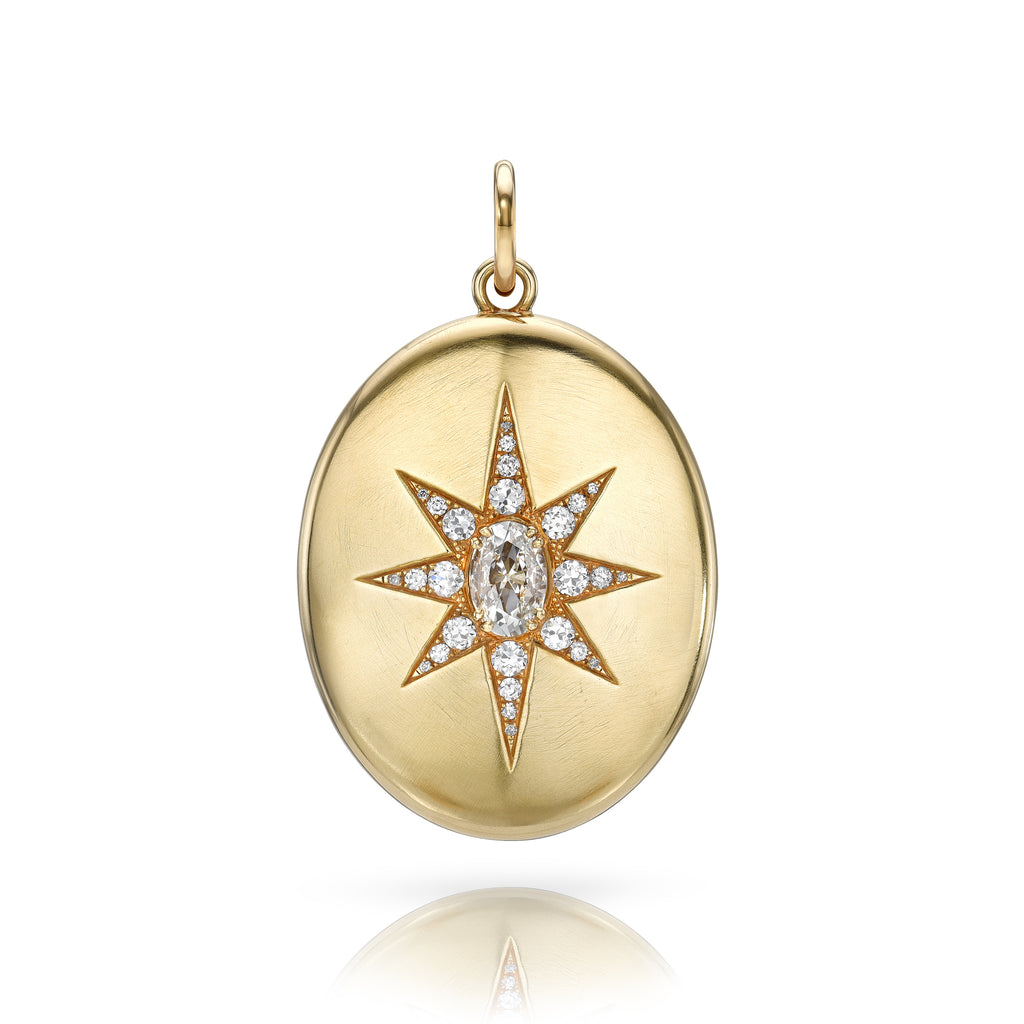 
Single Stone's Delphine pendant  featuring 1.34ct H/VS2 GIA certified antique oval cut diamond arranged in a star motif with 0.98ctw old European cut accent diamonds set in a handcrafted, high polish 18K yellow gold pendant.


