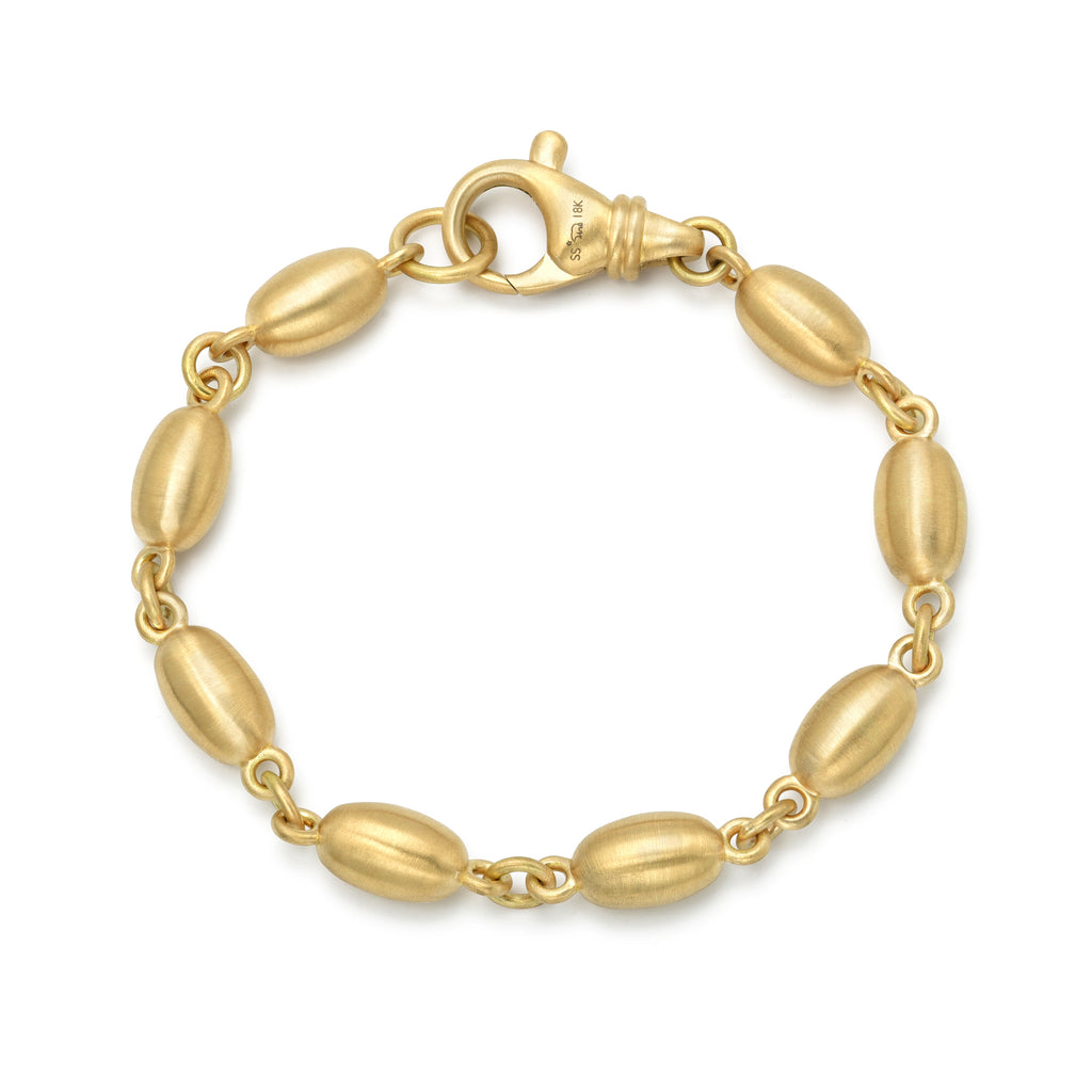 Single Stone's DOROTHY LUXE BRACELET  featuring Handcrafted 18K yellow gold large oval bead bracelet, available in a polished or satin finish. Bracelet measures 7.75&quot;
