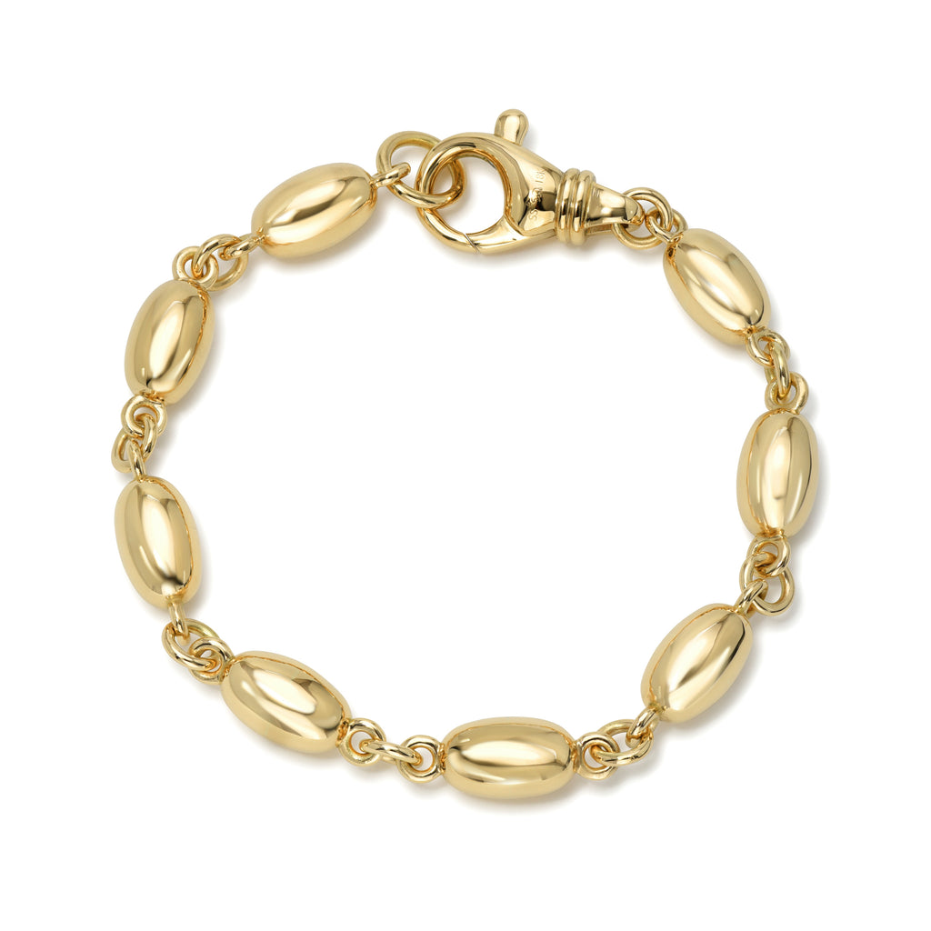 
Single Stone's Dorothy luxe bracelet  featuring Handcrafted 18K yellow gold large oval bead bracelet, available in a polished or satin finish.
Bracelet measures 7.75"
