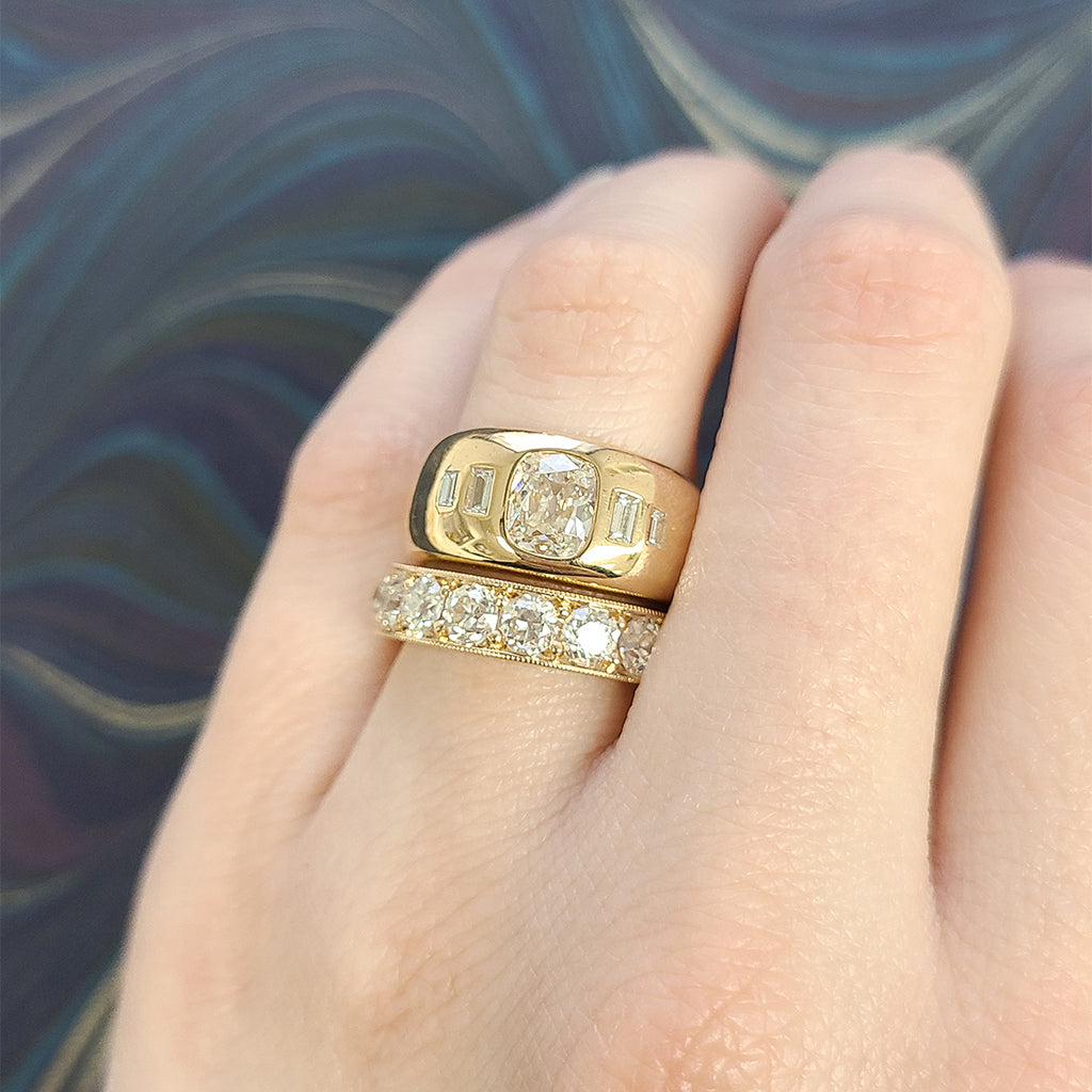 Single Stone's CARMELA LARGE band  featuring Approximately 3.30-3.80ctw G-H/VS old European cut diamonds pavé set in a handcrafted eternity band. Approximate band width 4.9mm. Please inquire for additional customization.
