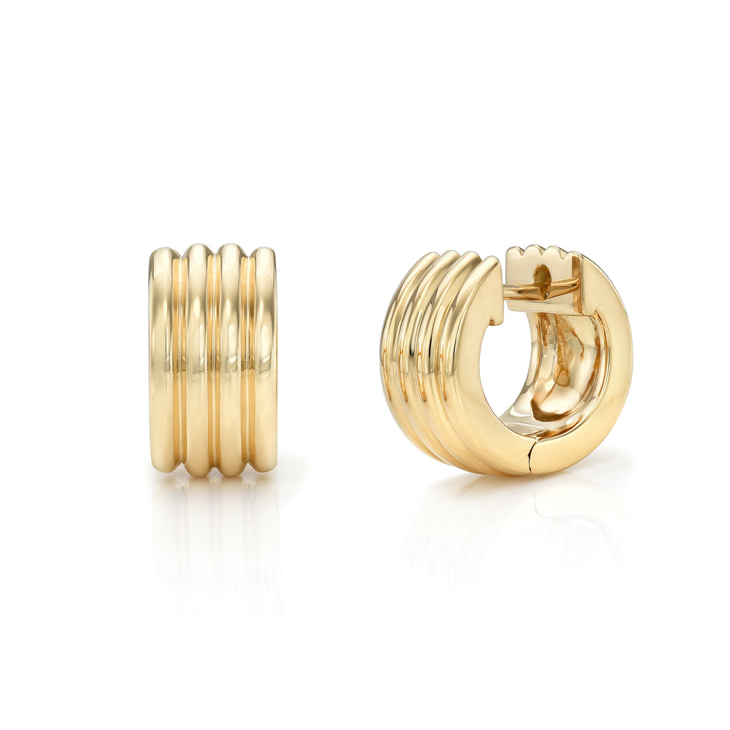 
Single Stone's Eleni huggies earrings  featuring Handcrafted 18K yellow gold huggie earrings.

