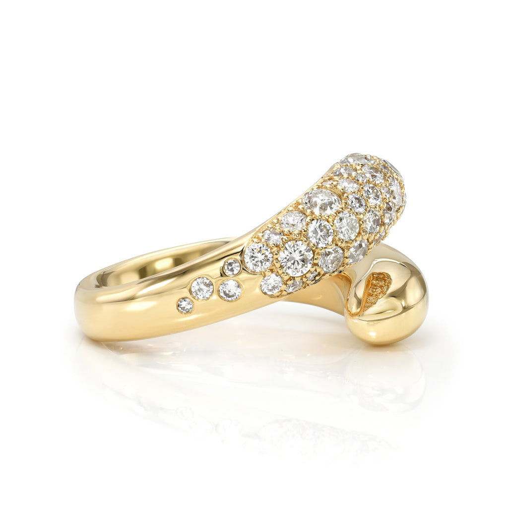 Single Stone's EVE COBBLESTONE ring  featuring Approximately 1.30-1.40ctw varying old and round brilliant cut diamonds set in a handcrafted 18K yellow gold bypass ring.
