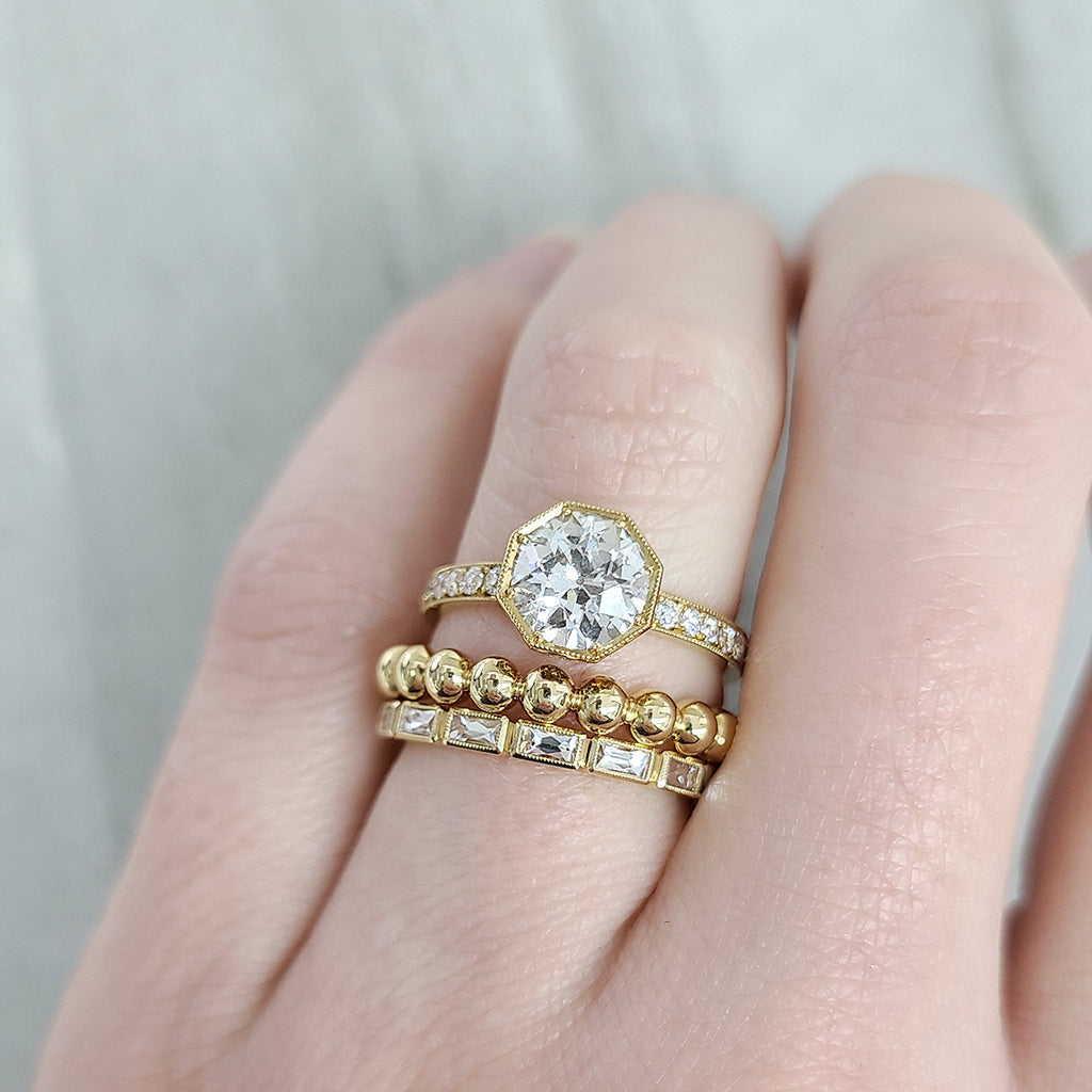 Single Stone's EMERSON WITH DIAMONDS ring  featuring 1.41ct J/SI2 GIA certified old European cut diamond with 0.20ctw old European cut accent diamonds prong set in a handcrafted 18K yellow gold mounting.
