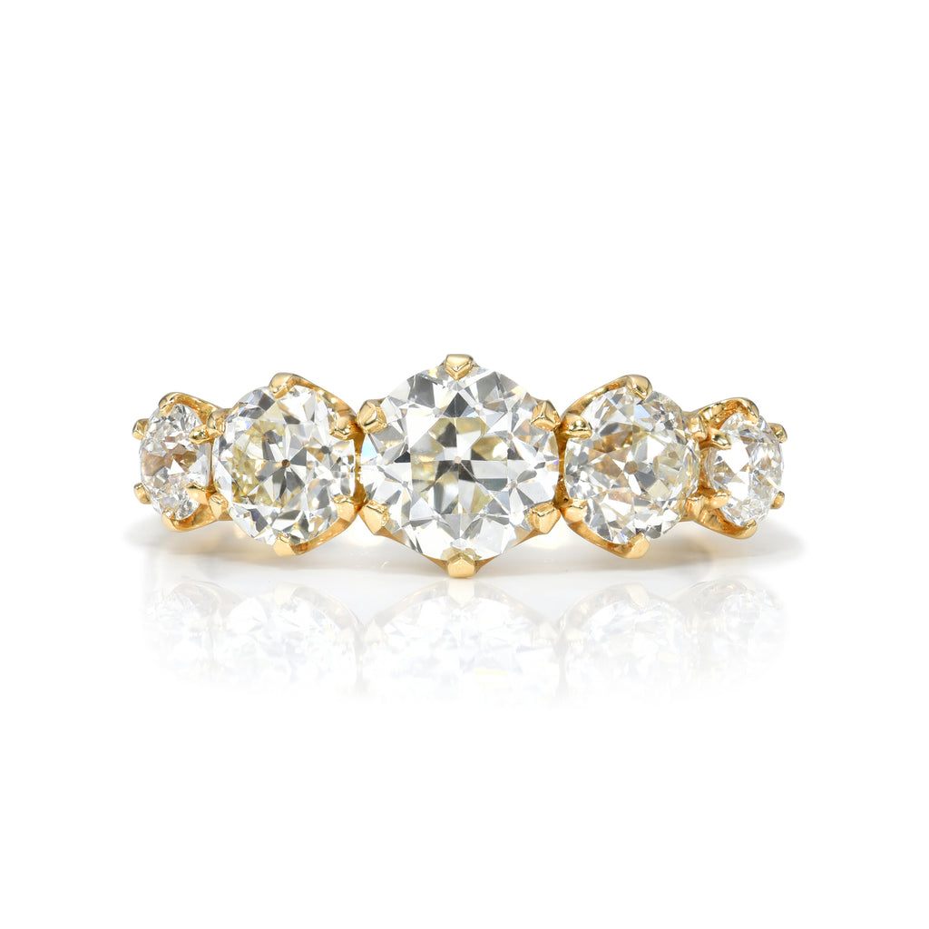 Single Stone's FIVE STONE GIA ring  featuring 1.89ctw J-K/VS1-VS2-SI1 GIA certified old European cut diamonds with 0.41ctw old European cut accent diamonds prong set in a handcrafted 18K yellow gold mounting.
