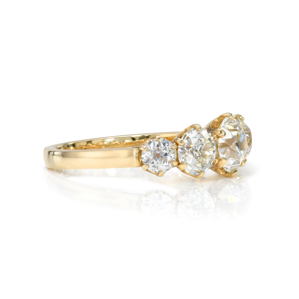 Single Stone's FIVE STONE GIA ring  featuring 1.89ctw J-K/VS1-VS2-SI1 GIA certified old European cut diamonds with 0.41ctw old European cut accent diamonds prong set in a handcrafted 18K yellow gold mounting.

