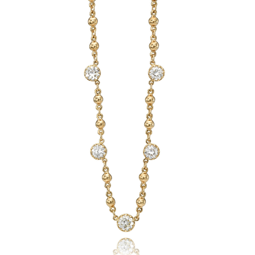 Single Stone's FIVE STONE ROSALINA NECKLACE  featuring 1.89ctw H-L/VS-SI old European cut diamonds prong set on our handcrafted 18K yellow gold Rosary chain. Necklace measures 17.5&quot;
