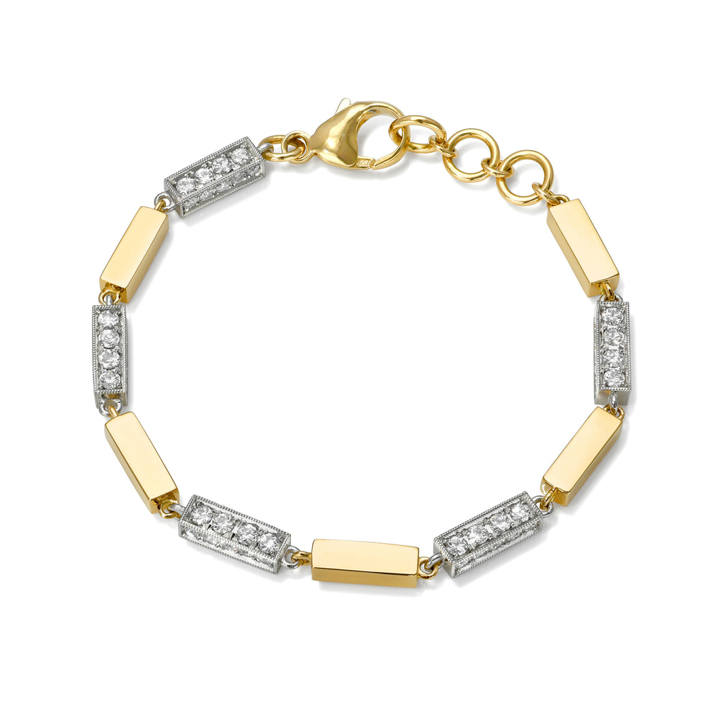 
Single Stone's Giana bracelet with diamonds  featuring Approximately 3.30ctw G-H/VS old European cut diamonds pavé set on a handcrafted, alternating platinum and 18K yellow gold full bar bracelet.
Bracelet measures 7.5"

