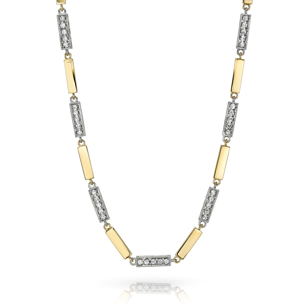
Single Stone's Giana necklace with diamonds earrings  featuring 8.75ctw G-H/VS old European cut diamonds pavé set in a handcrafted alternating 18K yellow gold and platinum full bar necklace.
Necklace measures 17.5".
