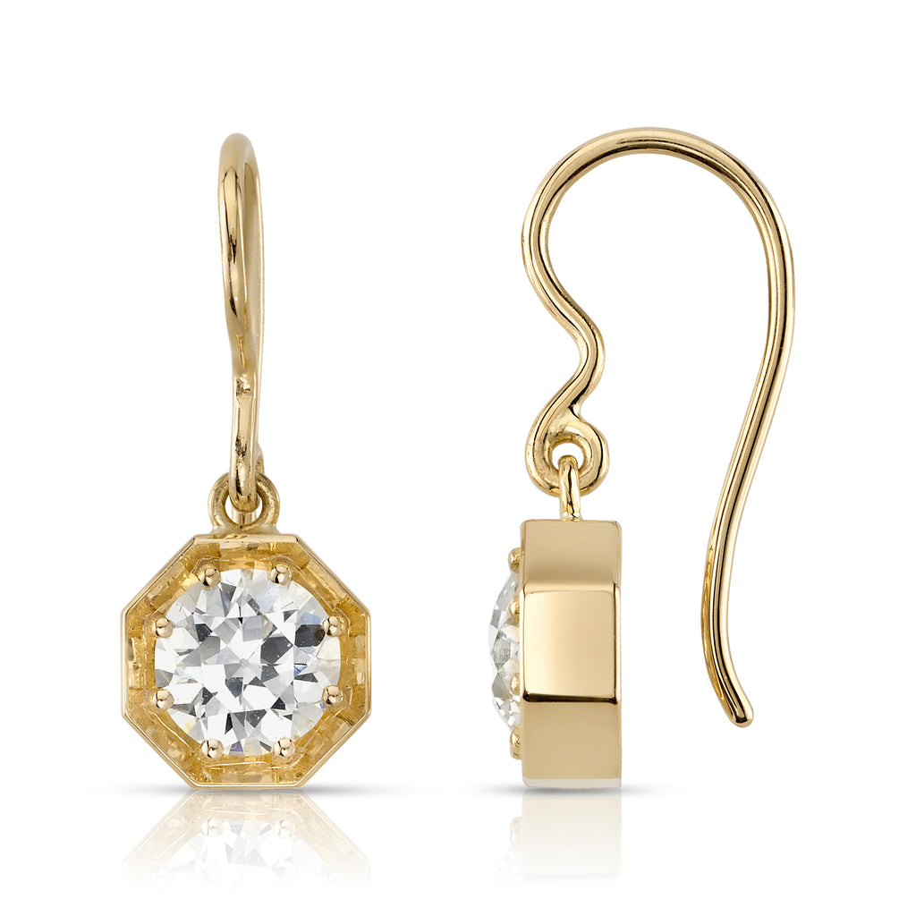 
Single Stone's Gemma drops earrings  featuring 1.88ctw K-L/VVS2-SI1 GIA certified old European cut diamonds prong set in handcrafted 18K yellow gold drop earrings. 

