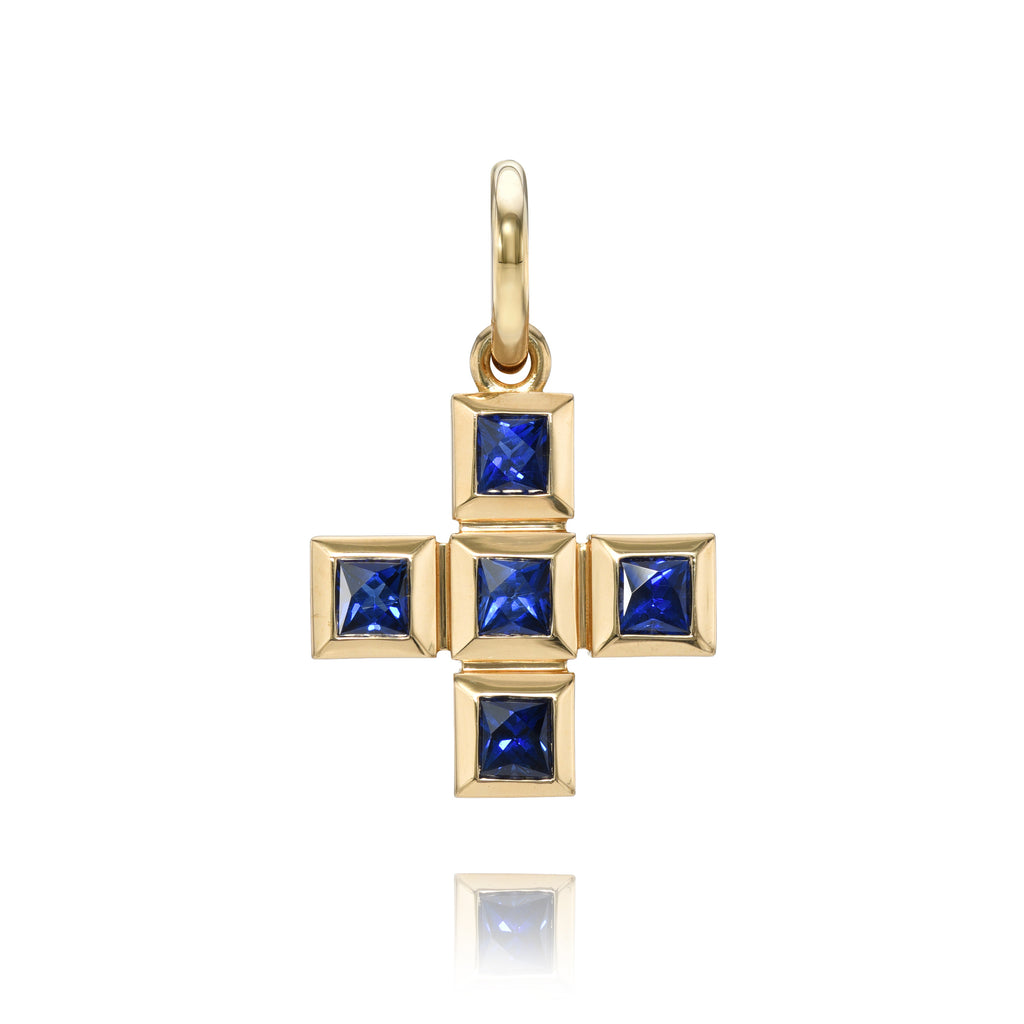 Single Stone's KARINA CROSS WITH GEMSTONES pendant  featuring Approximately 1.20ctw-1.40ctw French cut gemstones bezel set in a handcrafted 18K yellow gold cross pendant. Price does not include chain.
