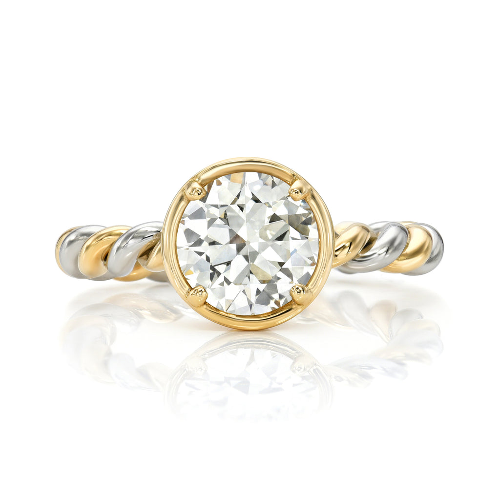
Single Stone's Lara ring  featuring 1.81ct K/VS1 GIA certified old European cut diamond prong set in a handcrafted twisted 18K yellow gold and platinum mounting.

