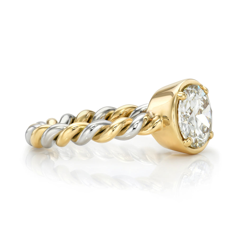 Single Stone's LARA ring  featuring 1.81ct K/VS1 GIA certified old European cut diamond prong set in a handcrafted twisted 18K yellow gold and platinum mounting.
