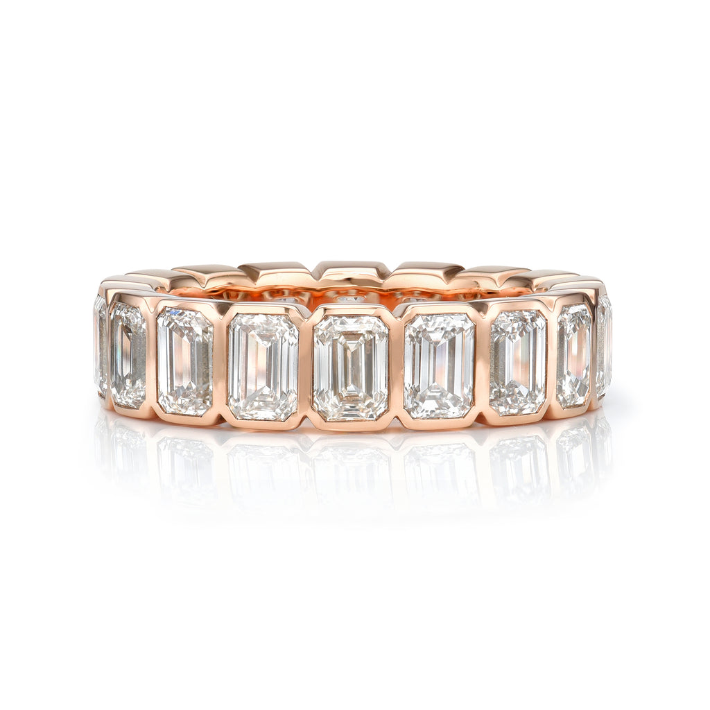 Single Stone's ATHENA LARGE band  featuring Approximately 5.50ctw I/VS emerald cut diamonds bezel set in a handcrafted eternity band.
