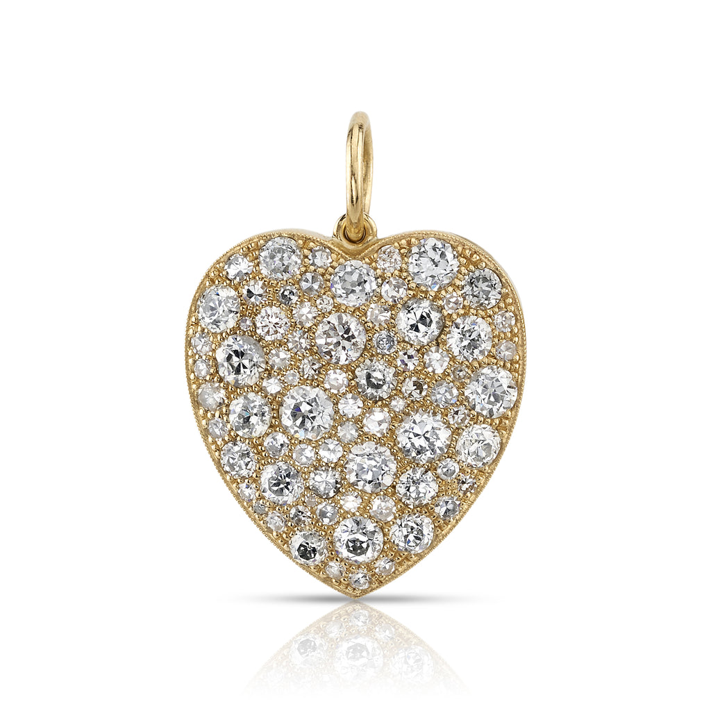 
Single Stone's Large cobblestone heart pendant  featuring 4.54ctw old cut and round brilliant cut diamonds set in a handcrafted 18K yellow gold heart shaped pendant. 
Pendant measures 22mm x 22mm.
Cobblestone pattern varies from piece to piece.
