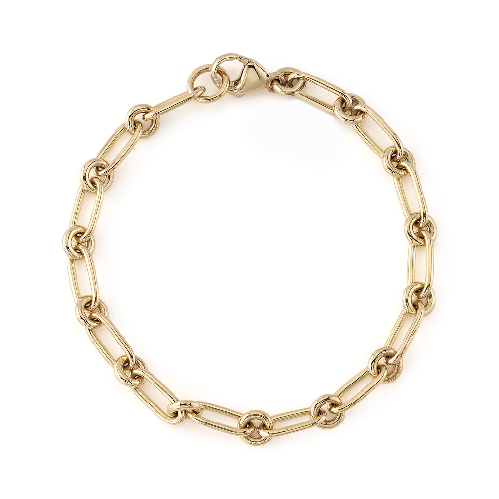 
Single Stone's Lo bracelet ring  featuring Handcrafted 18K gold oval and round link bracelet. Bracelet measures 7.5".
Please inquire for additional customization. 
