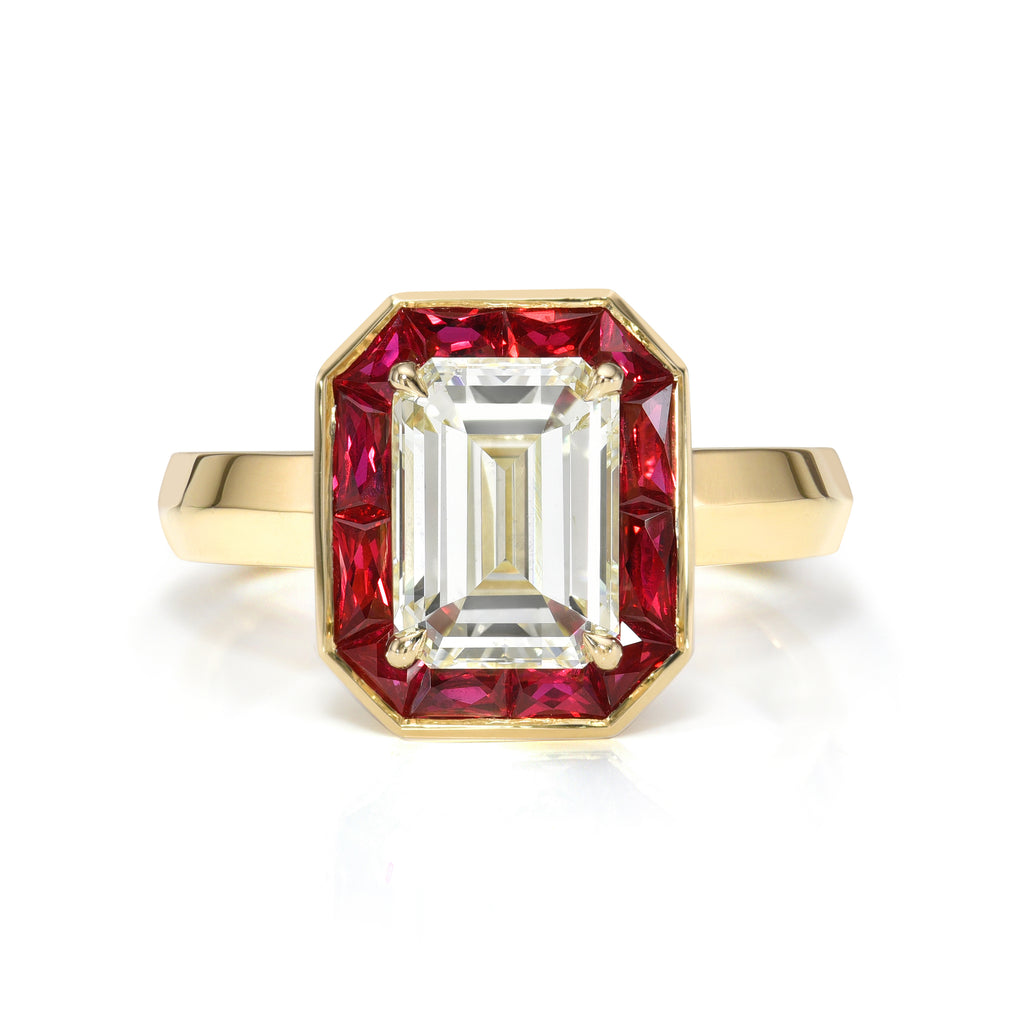 Single Stone's MARIA ring  featuring 2.00ct M/VS2 GIA certified emerald cut diamond surrounded by 1.15ctw French cut rubies set in a handcrafted 18K yellow gold mounting.
