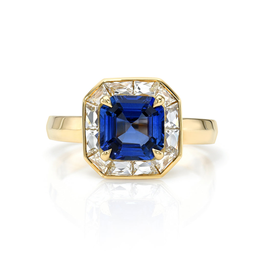 
Single Stone's Maria ring  featuring 2.18ct GIA certified Asscher cut Sri Lankan blue sapphire with 0.85ctw French cut accent diamonds prong set in a handcrafted 18K yellow gold mounting.
