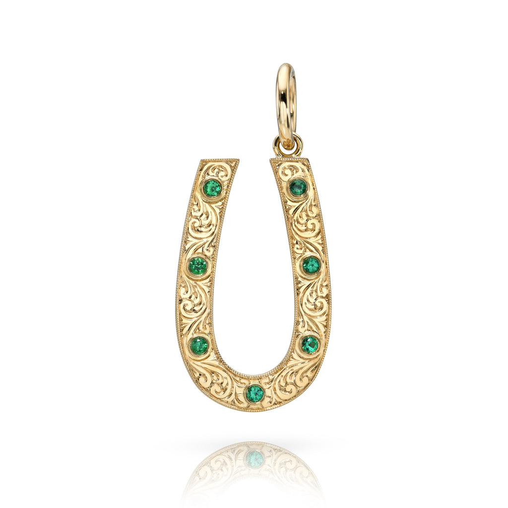 Single Stone's SMALL MARILYN WITH GEMSTONES pendant  featuring Approximately 0.20ctw round cut gemstones bezel set in a handcrafted, hand-engraved 18K yellow gold horseshoe shaped pendant.
