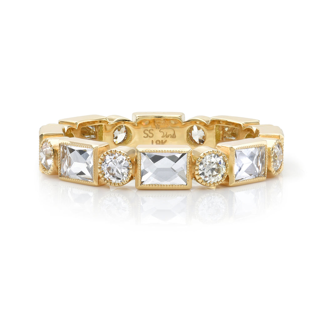 
Single Stone's Melissa band  featuring Approximately 2.00ctw G-H/VS old European and French cut diamonds bezel set in a handcrafted eternity band.
Approximate band width 3.4mm,
Please inquire for additional customization. 
